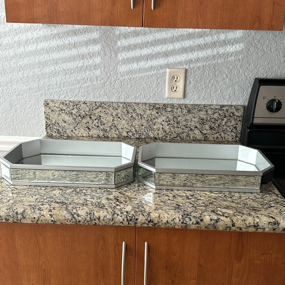 Two glass mirror trays, 16 inches wide 10 inches long